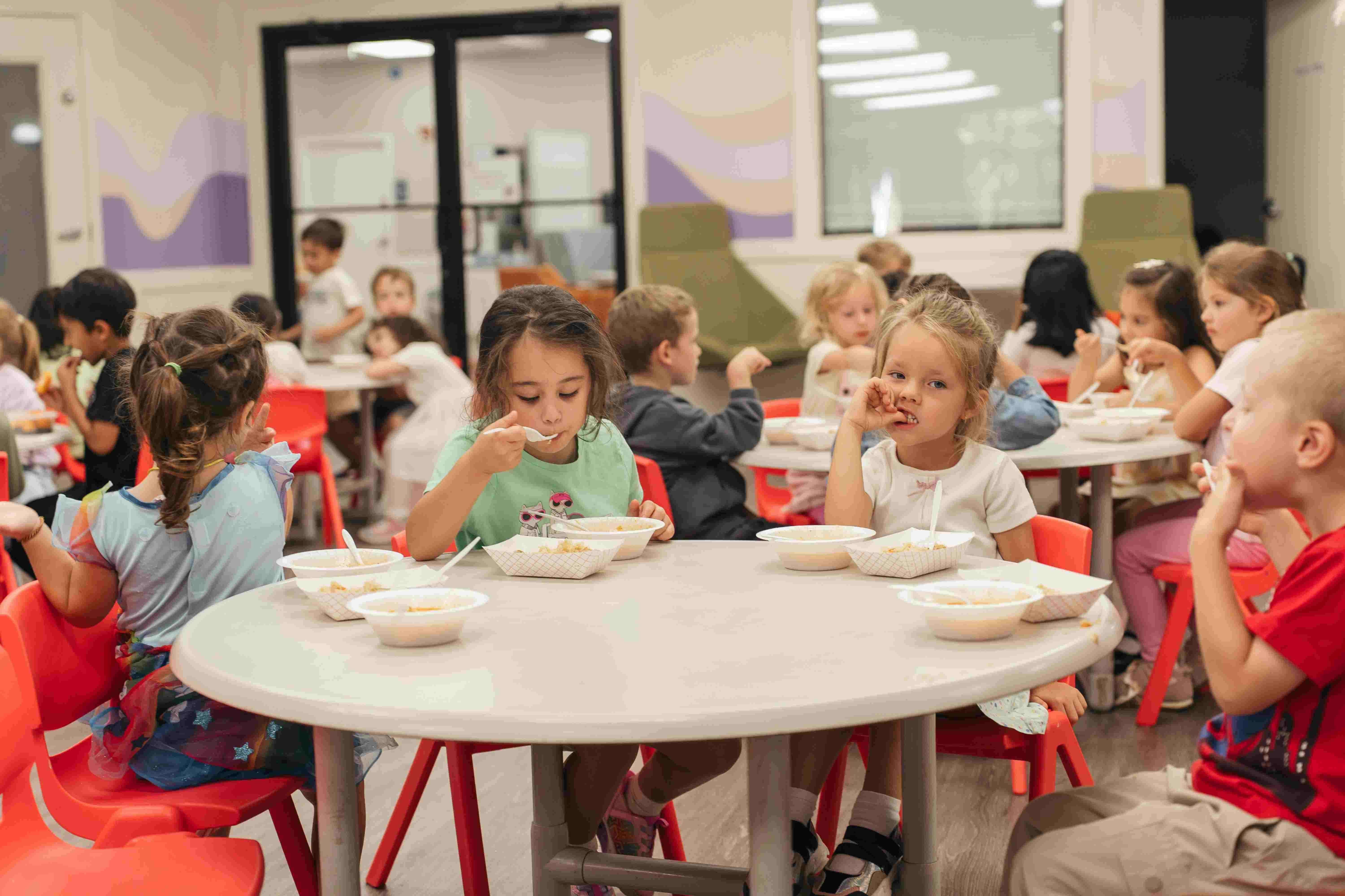 Children enjoying healthy lunch at Wonder World Academy